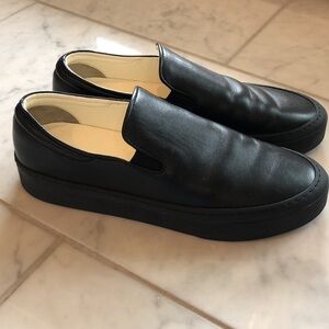 The Row black leather slip-on sneakers size 39.5